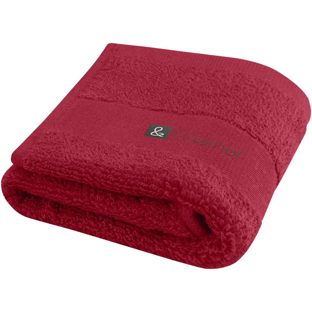 Serviette Sophia de 30 x 50 cm en coton de 450 g/m² rouge